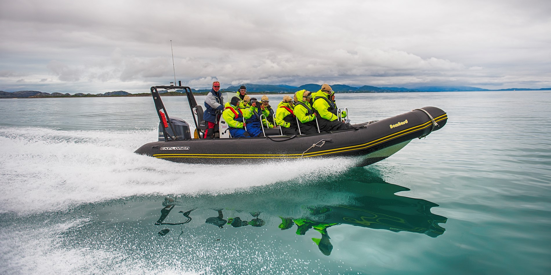 A RIB with 10 people speeding in Norway