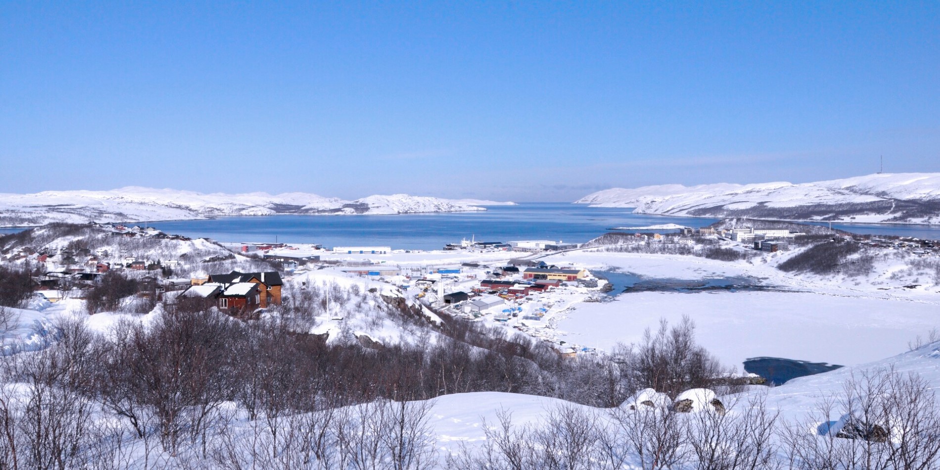 Snow over the port town of Kirkenes in Norway on the Russian border
